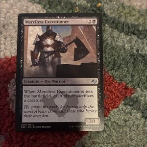 Magic Merciless Executioner Black Card with Silver Armor Artwork